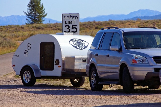 family-caravan-holidays-kids-and-caravan-640x480-9321524.jpeg